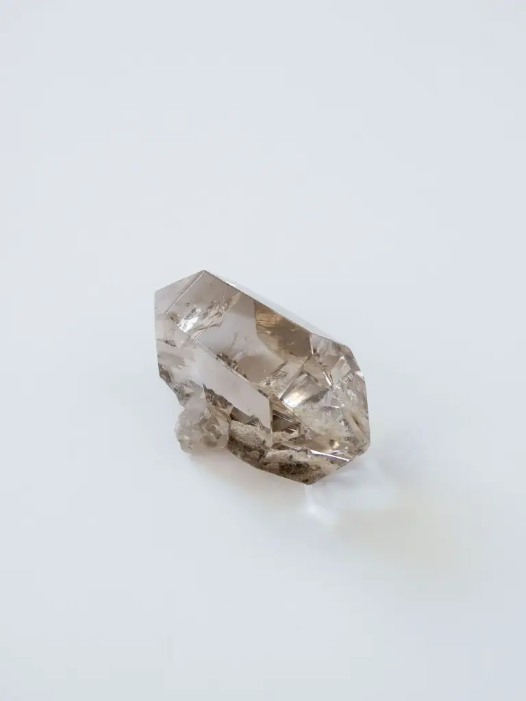 High Quality Clear Quartz With Light Smoky Rainbow Manifestation And Raw Side 62g